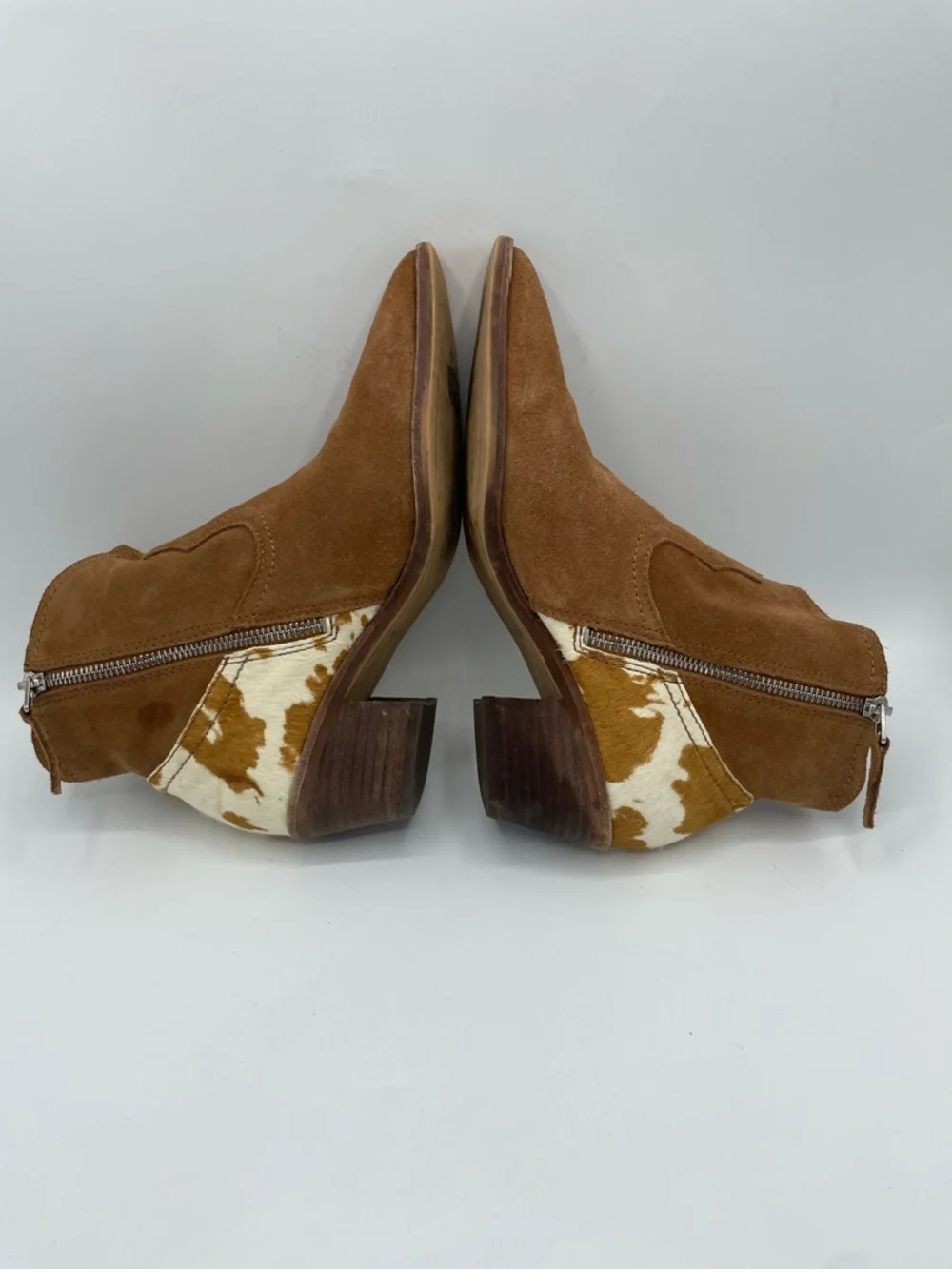 Dolce Vita Senica Suede Western Ankle Boot with Cowhide Heel Accent.